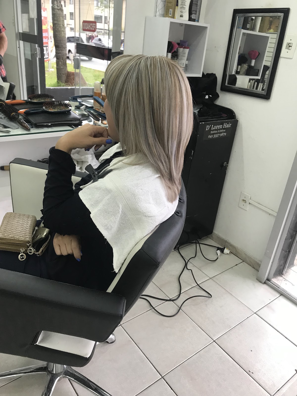 Atendimento de coloração no salão D'Loren Hair