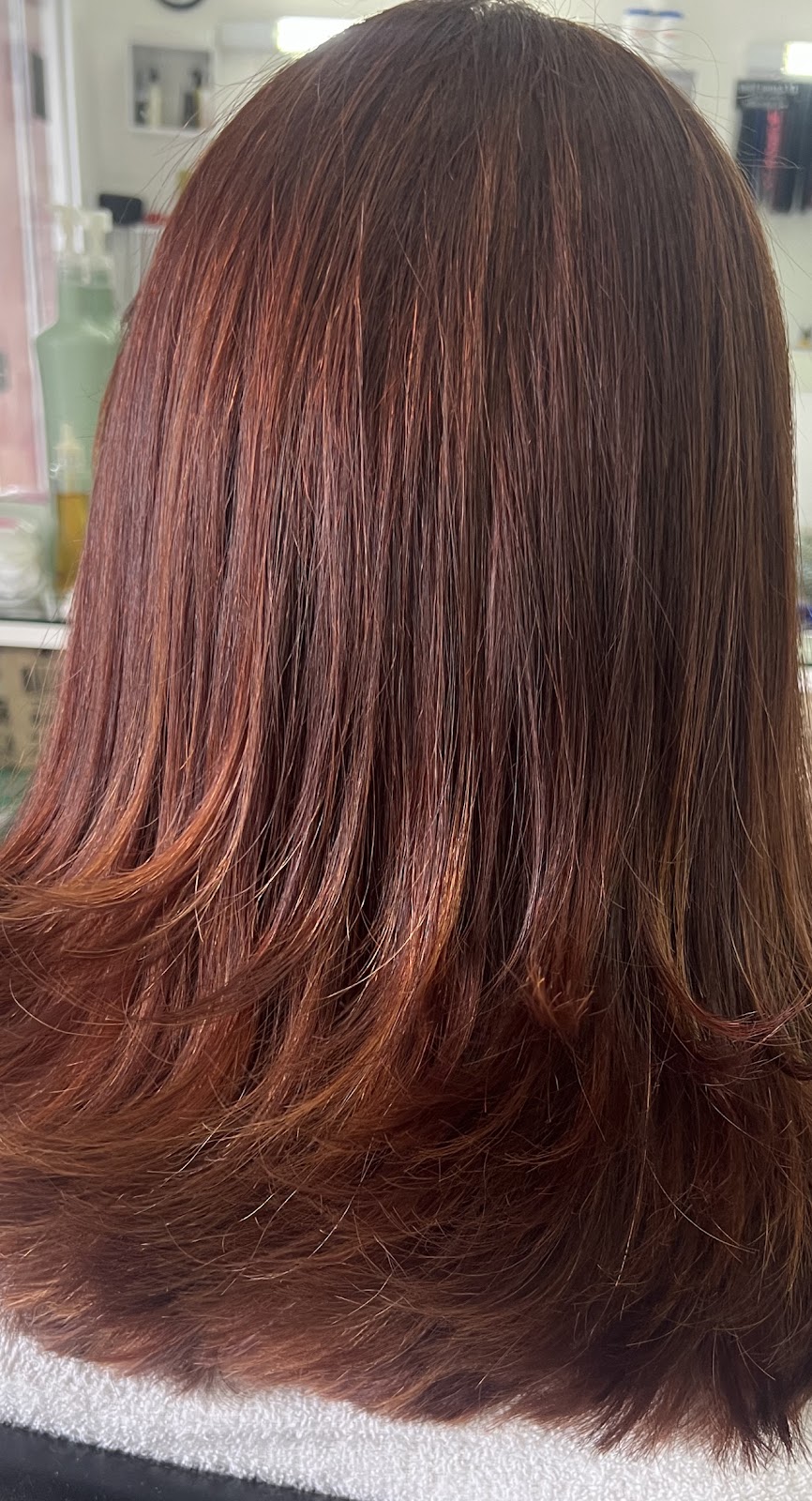 Coloração ruiva finalizada, cabelo liso